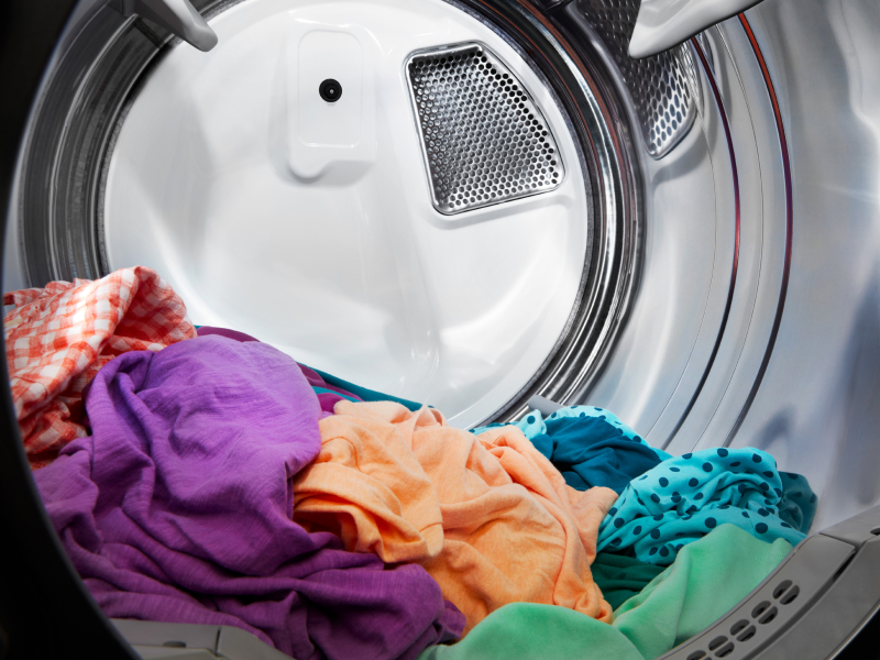 Dry clothes in a dryer drum