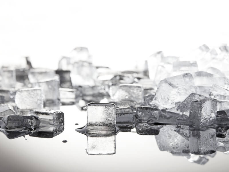 Ice cubes melting on a hard surface