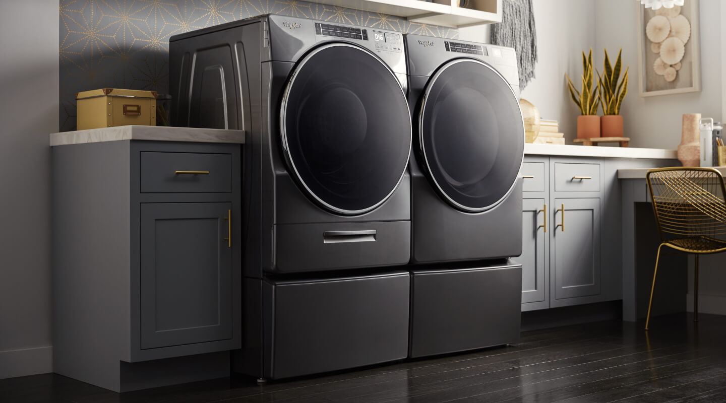 Black side-by-side washer and dryer from Whirlpool brand