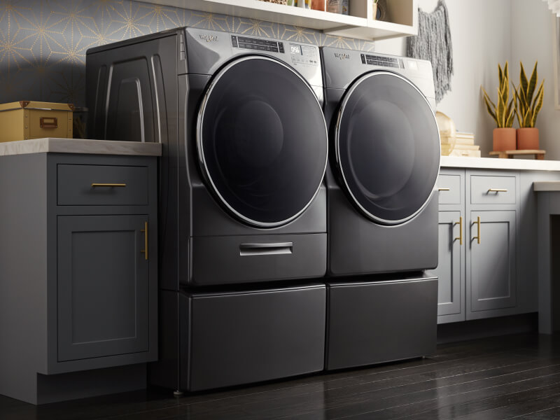 Black side-by-side washer and dryer from Whirlpool brand