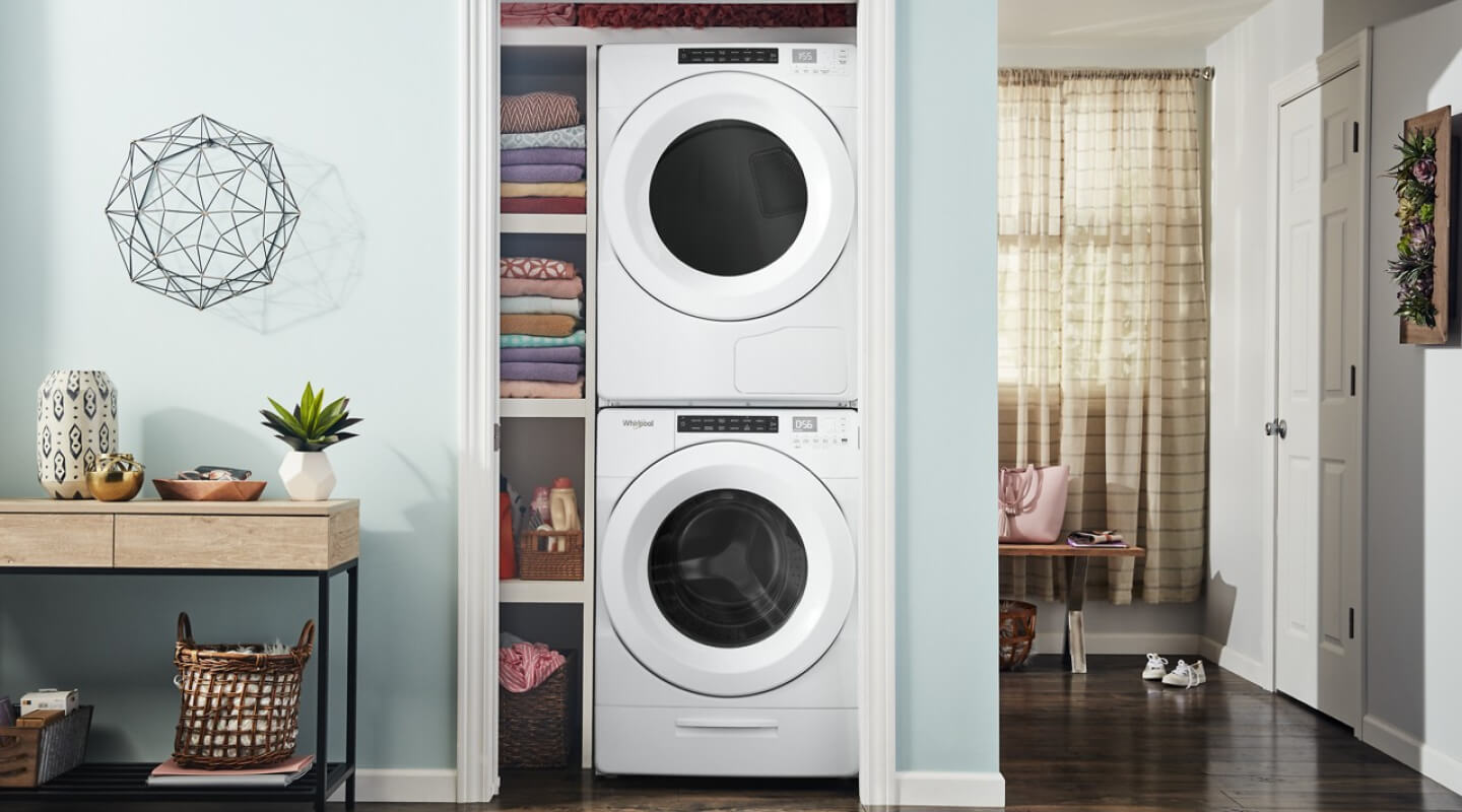 Stackable washer and dryer in a closet