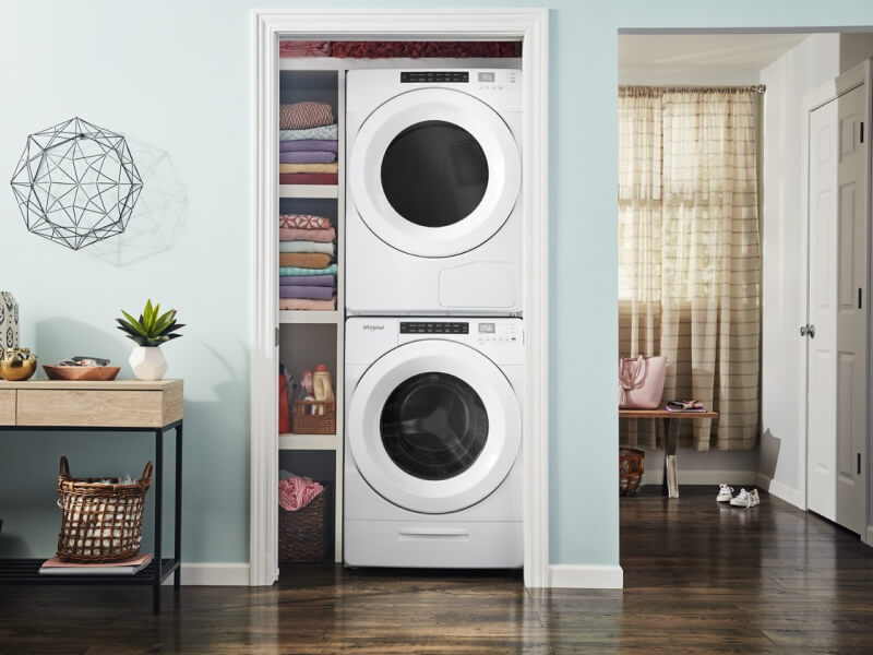 Stackable washer and dryer in a closet