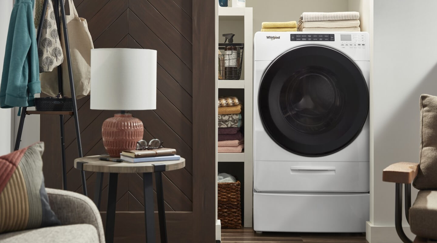 All-in-one laundry center inside a closet