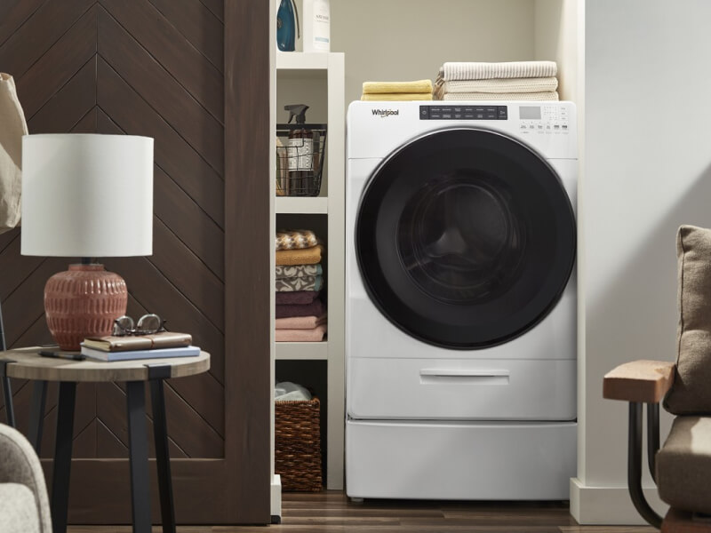 All-in-one laundry center inside a closet