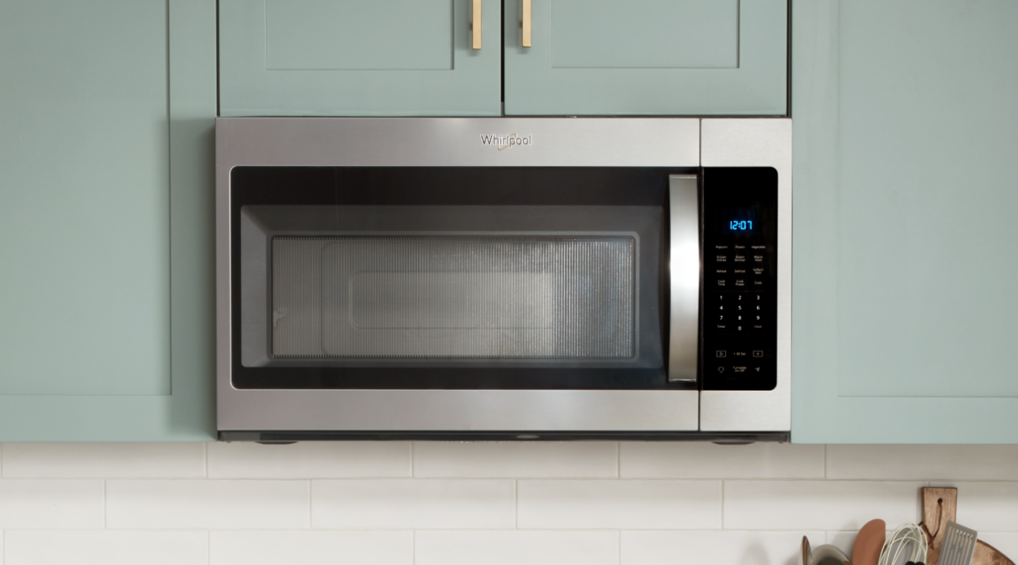 Whirlpool® Over-the-Range Microwave in blue cabinetry