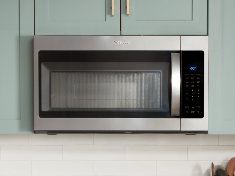 Whirlpool® Over-the-Range Microwave in blue cabinetry