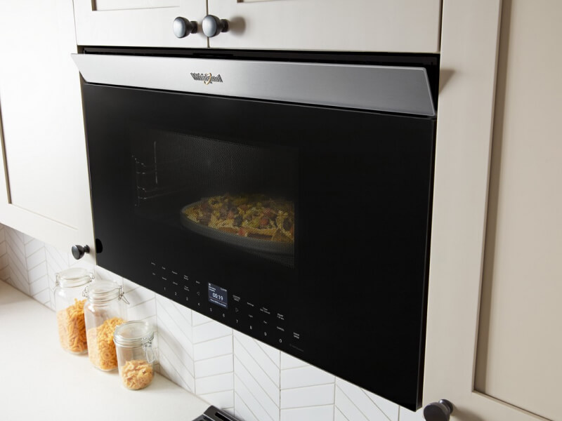 Whirlpool® Over-the-Range Microwave flush with cabinetry