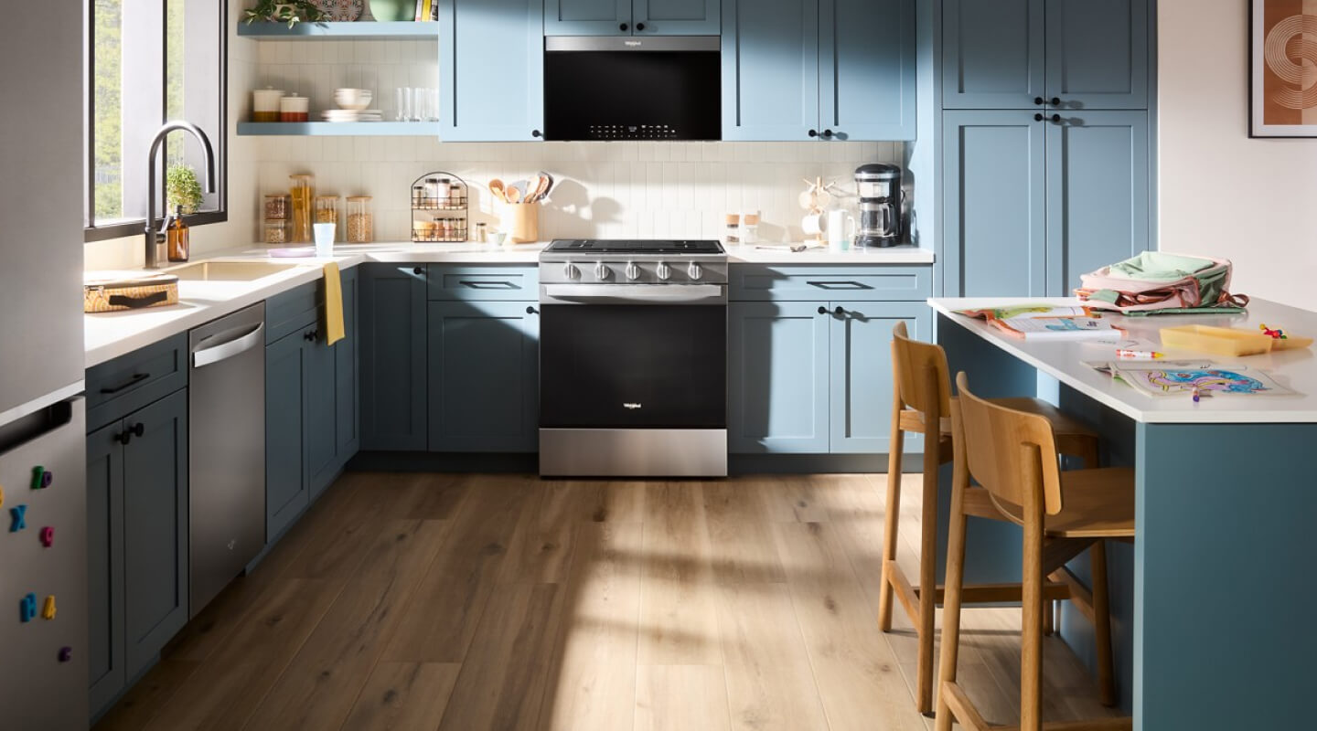 Modern kitchen with blue cabinets