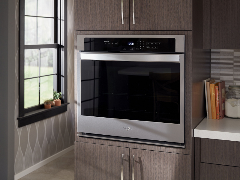 A Whirlpool® wall oven in a modern kitchen.