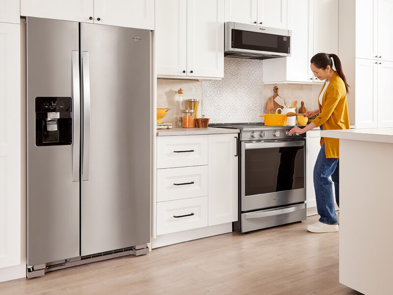 A person cooking at their stovetop