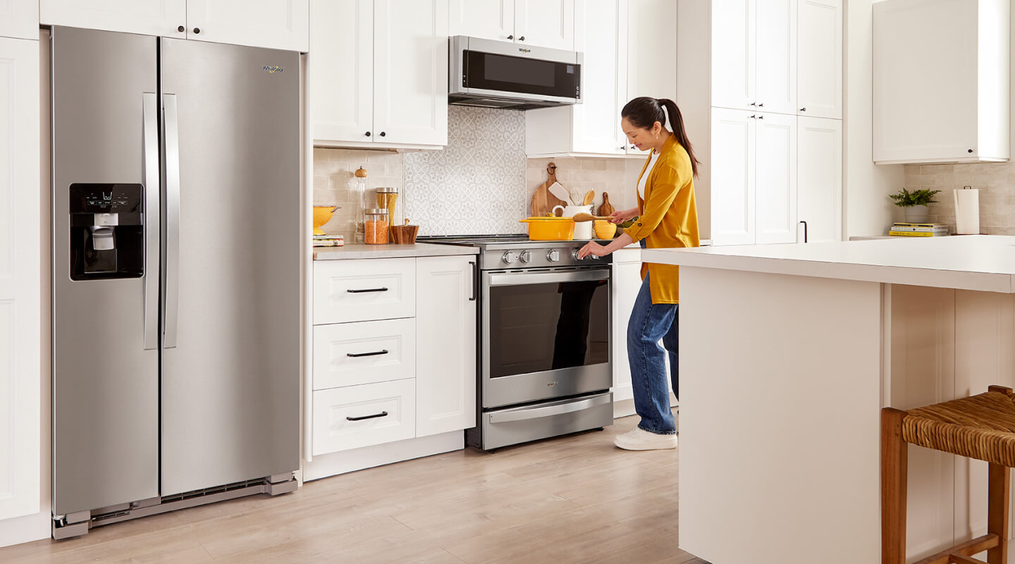 A person cooking at their stovetop
