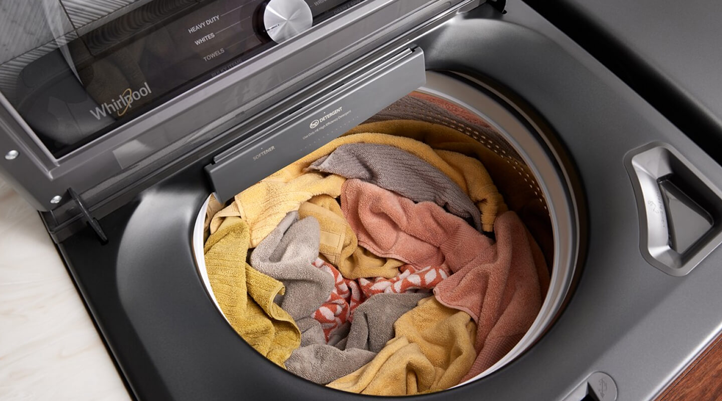 Overhead view of a load of rags and towels in a washing machine