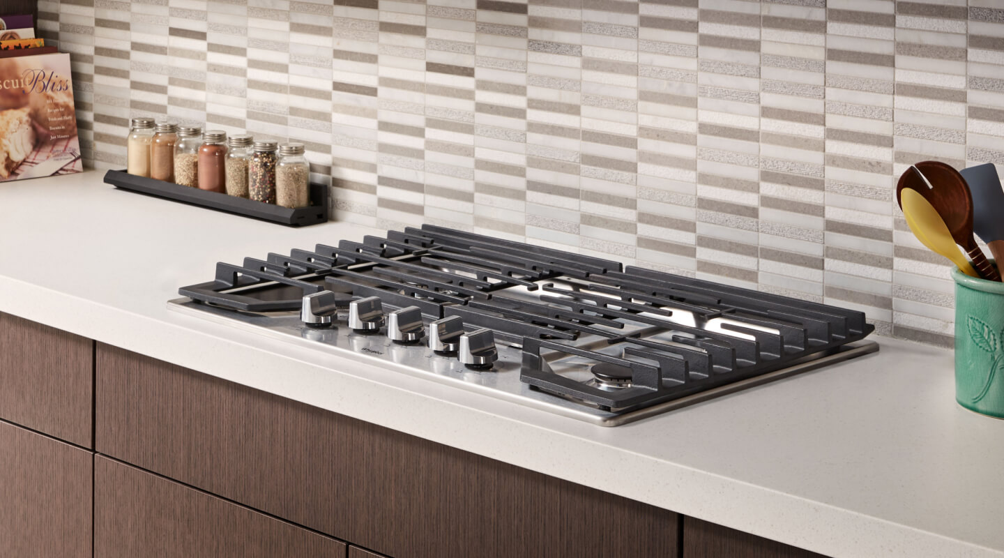Whirlpool brand gas cooktop in a modern kitchen