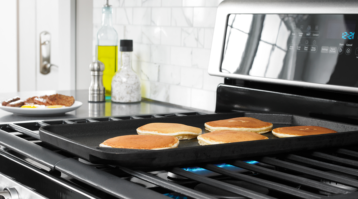 Pancakes cooking on a Whirlpool® gas range