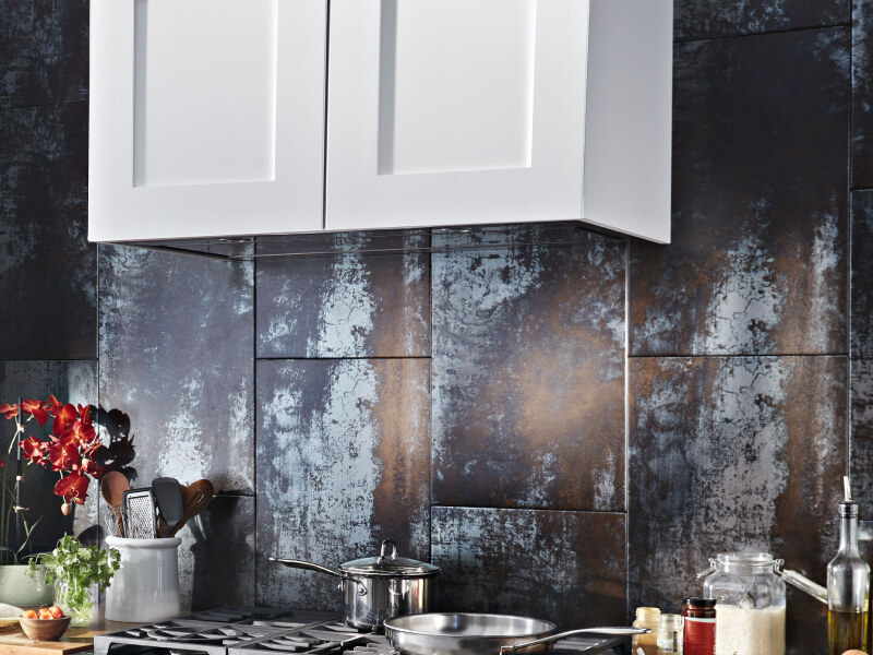 A range hood liner with ingredients on a counter nearby.