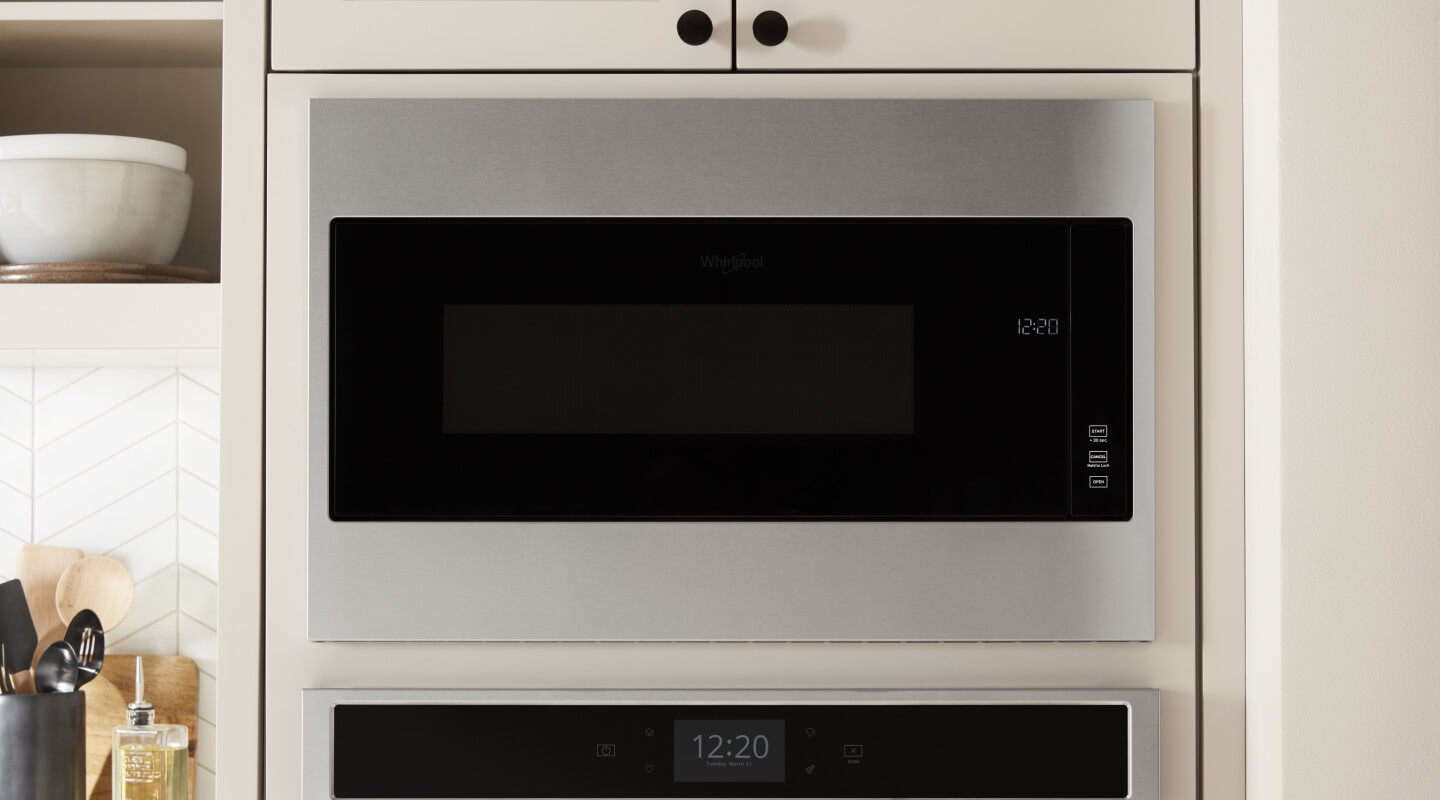 Stainless steel microwave built in to cabinetry