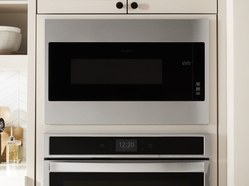 Stainless steel microwave built in to cabinetry