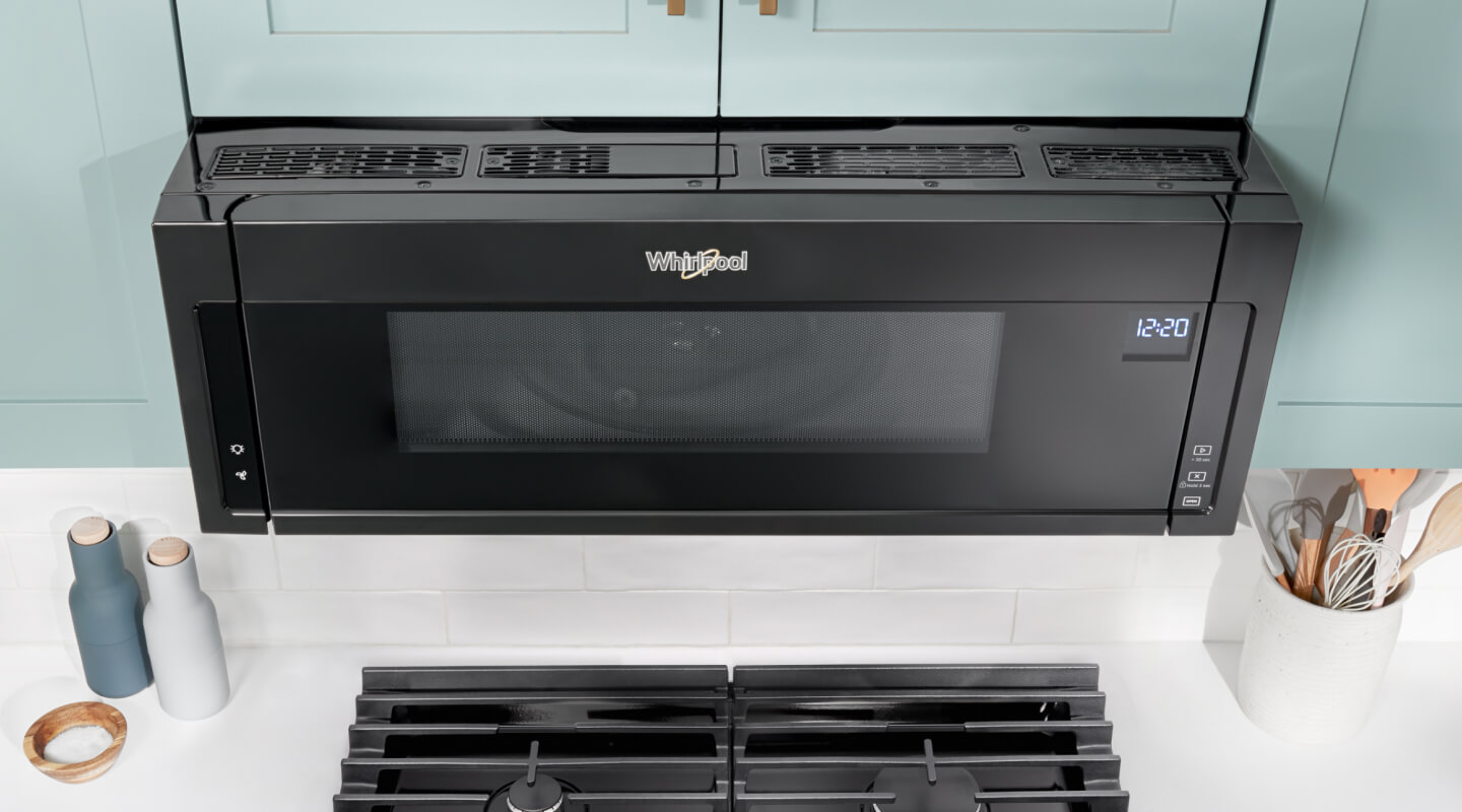 A Whirlpool® Low-Profile Microwave Hood combination