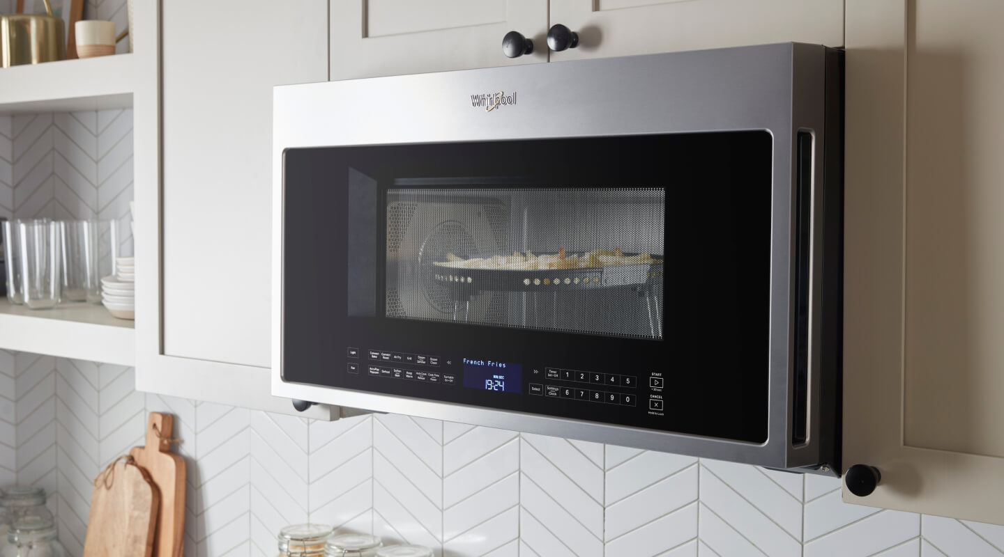 Whirlpool® Microwave with food cooking inside