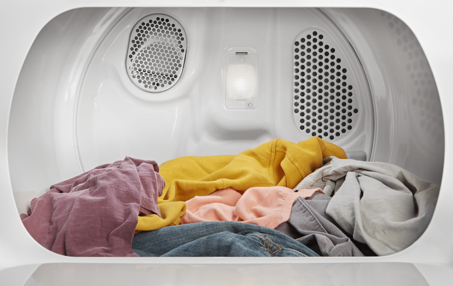 Dry clothing inside dryer