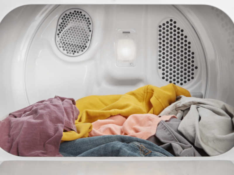 Dry clothing inside dryer