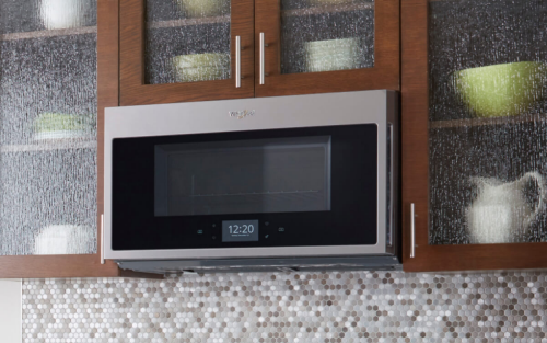 Whirlpool® Over-the-Range Microwave in brown cabinetry