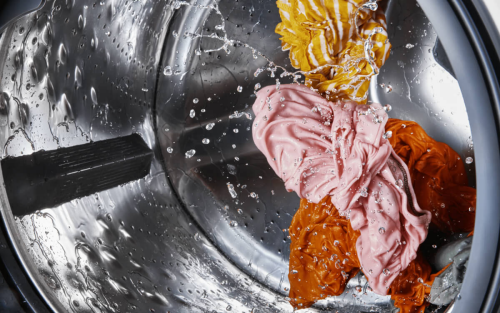 Wet clothing spinning in a washing machine