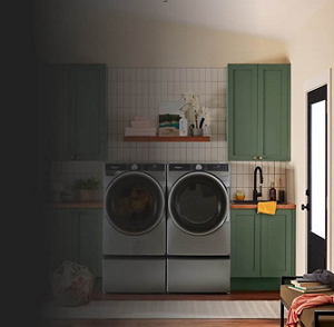 A laundry room with a front load washer and dryer pair