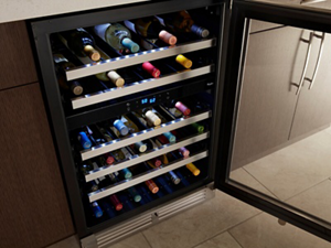 A beverage center filled with wine